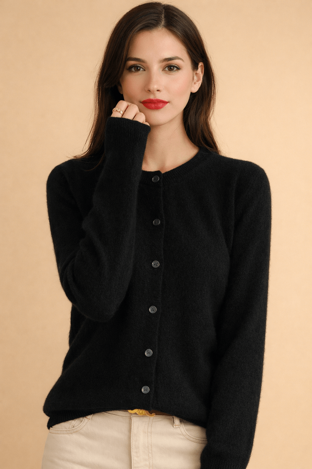 Classic women's cardigan featuring front buttons and a timeless round neck design, perfect for layering in any season. 0